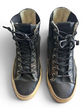 Golden Goose woman’s Black High-Top Sneakers with Tan Gum Sole